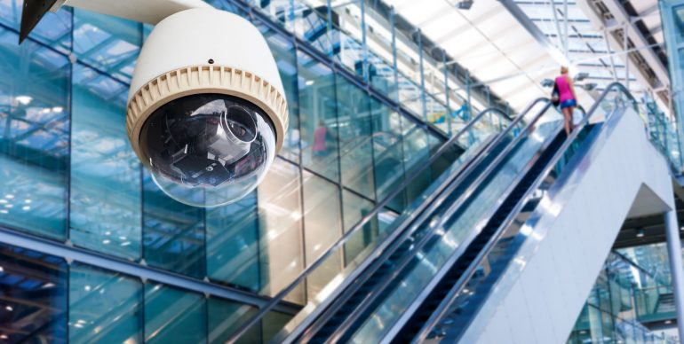 27825618 - cctv camera or surveillance operating on escalator